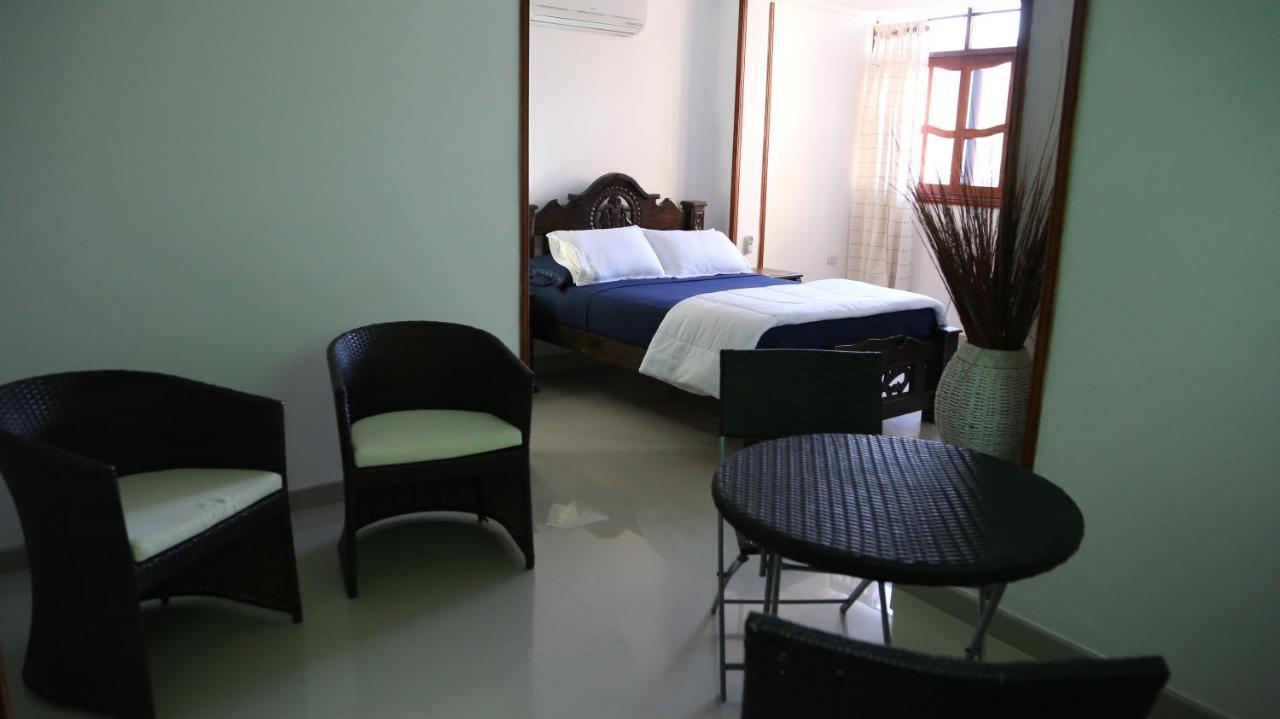 Hostal Pelikan Таганга Экстерьер фото