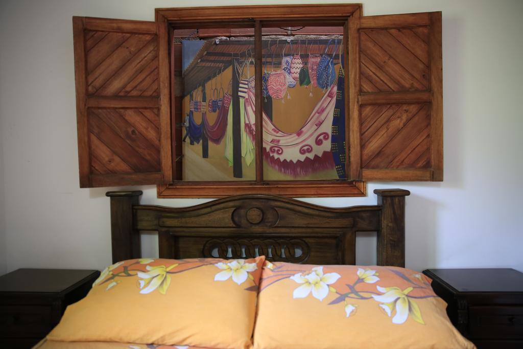 Hostal Pelikan Таганга Экстерьер фото